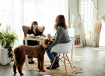 Top Etobicoke realtor Leslie Brlec with her pets and a client